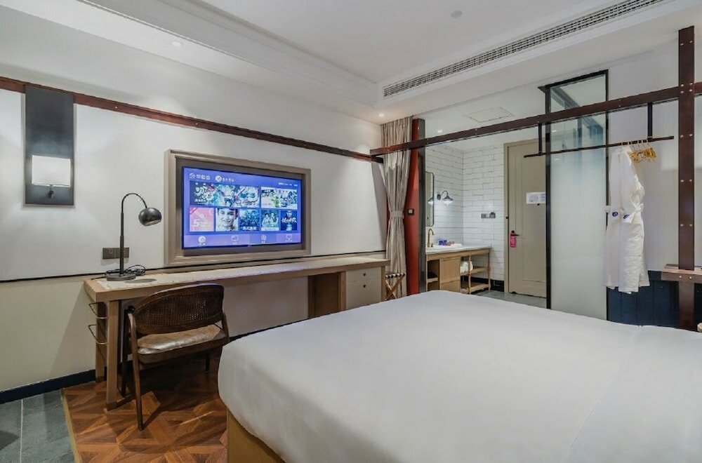 Фото Manxin Hotel Qingdao Zhanqiao