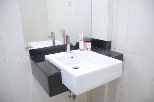 Гостиница Super Oyo 1006 Azzahra Guest House Syariah в Амбоне