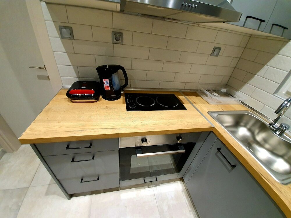 Фото Cosmopolitan Apartments Nilie Suites & Aprts