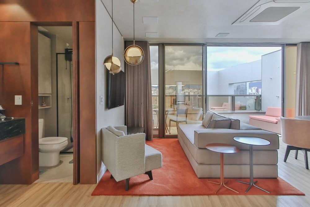 Фото Loft alto padrão com varanda