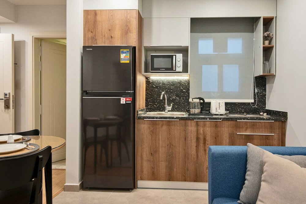 Фото Parkside Boutique Furnished Apartments