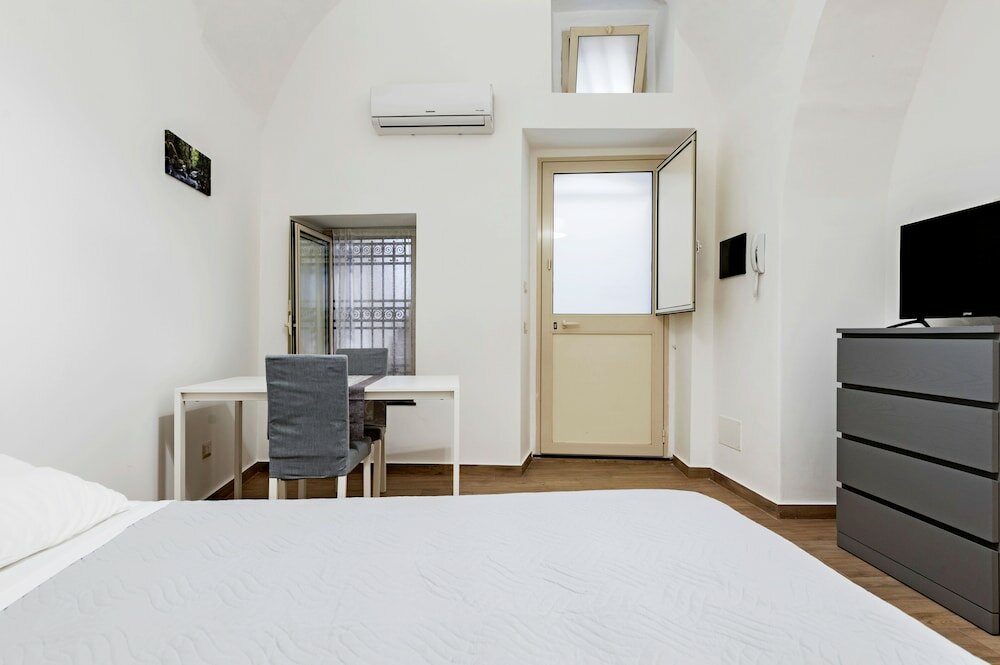 Фото Trinità 57 Apartments