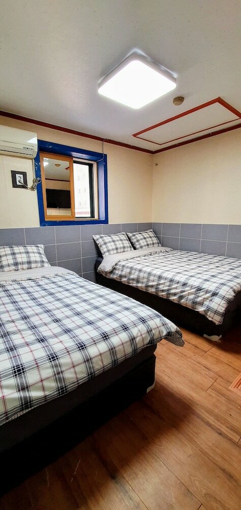 Фото New Sun Guesthouse Myeongdong