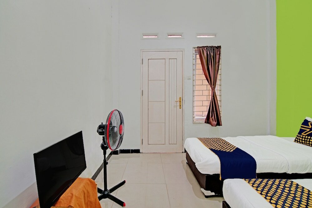 Фото Spot On 92536 Teguh Homestay Syariah