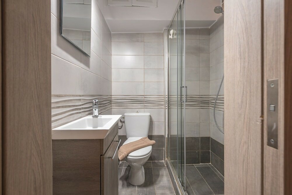 Фото Welcoming Koukaki Home by Cloudkeys