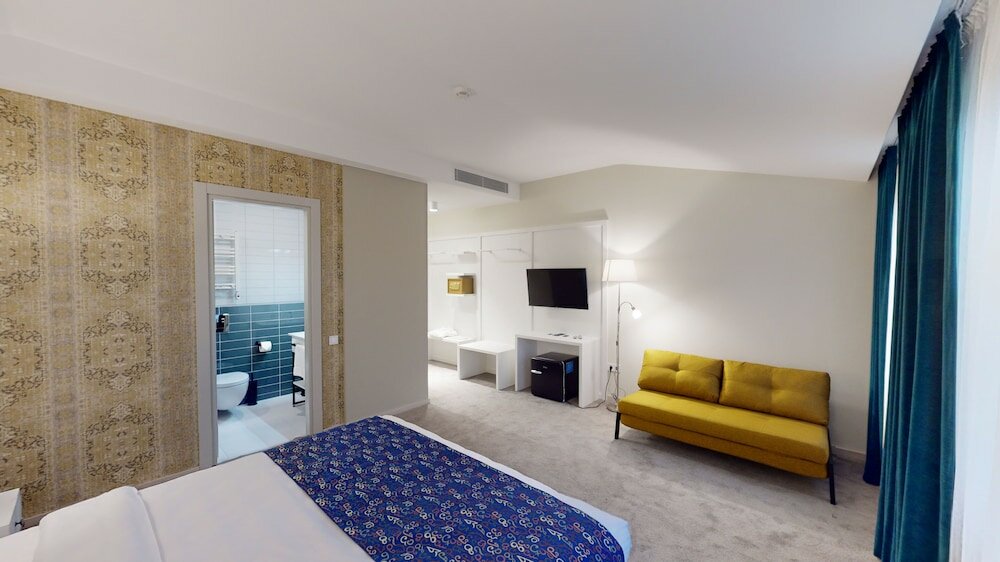 Фото Epigraph Town Hotel