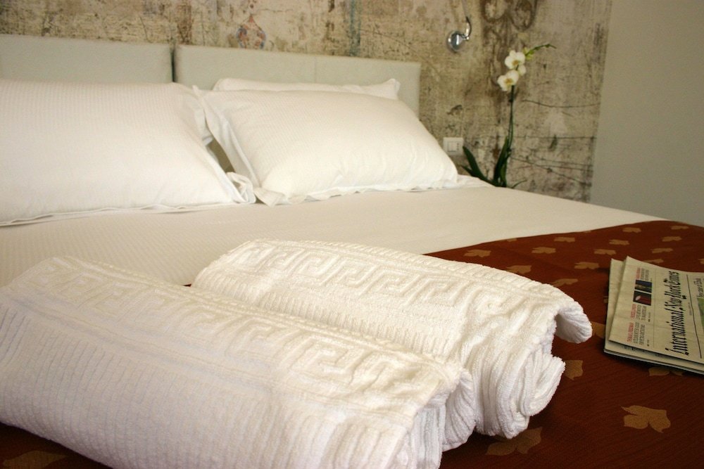 Фото Suites Farnese Design Hotel