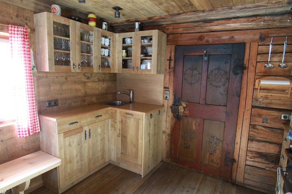 Фото Ferienwohnungen am Berg - Almhütte Alfen