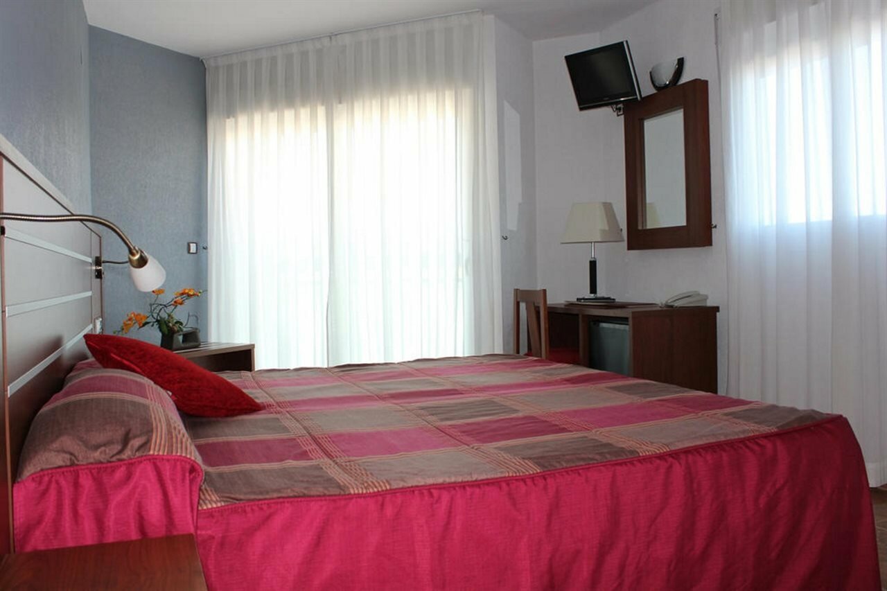 Фото Hotel La Familia Gallo Rojo