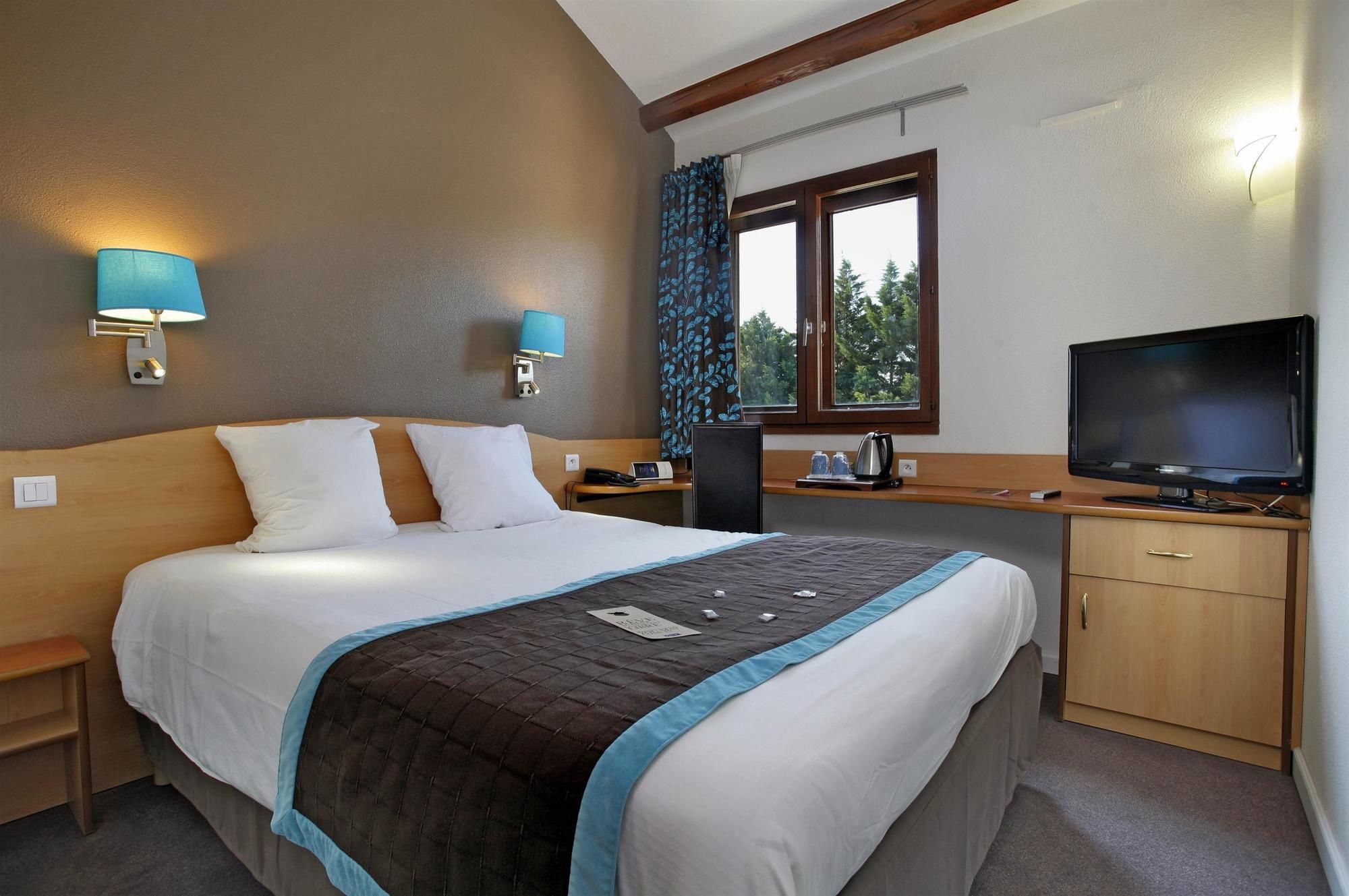 Фото Kyriad Montpellier Aeroport Gare Tgv Sud de France