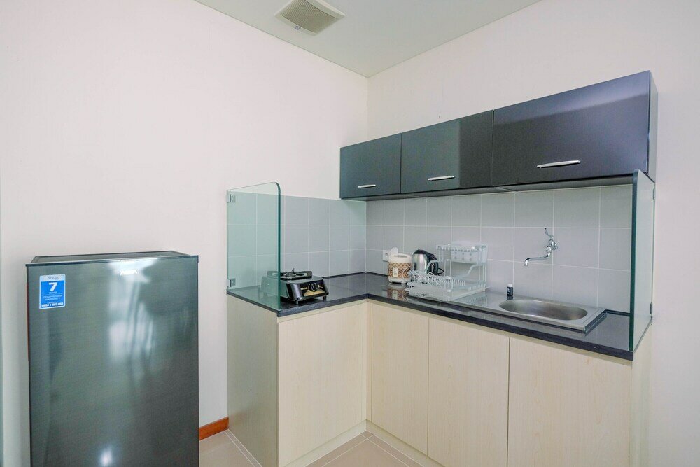 Фото Cozy and Minimalist 2br Green Bay Condominium Apartment