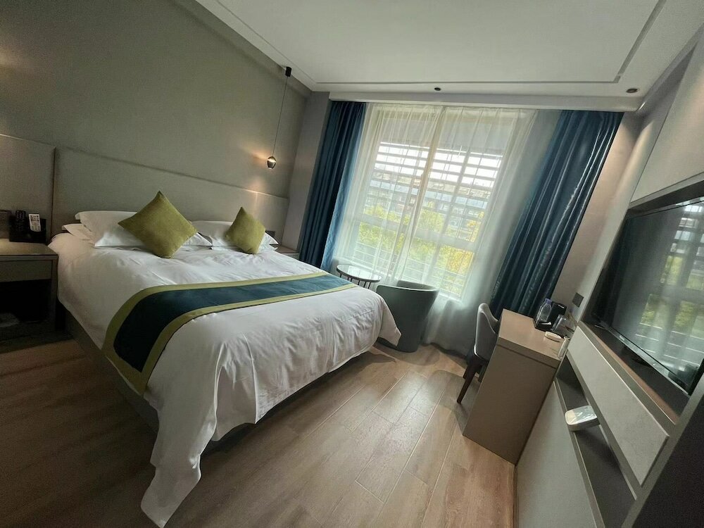 Фото Yiwu Manting City Hotel