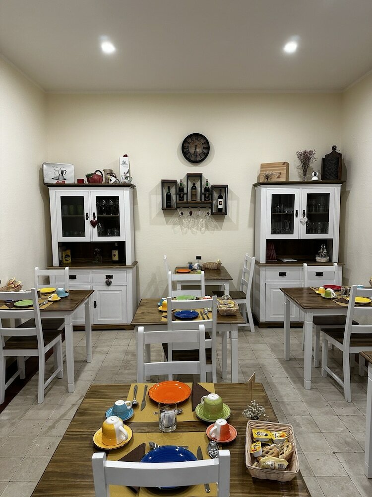 Фото Domo Achenza Guesthouse