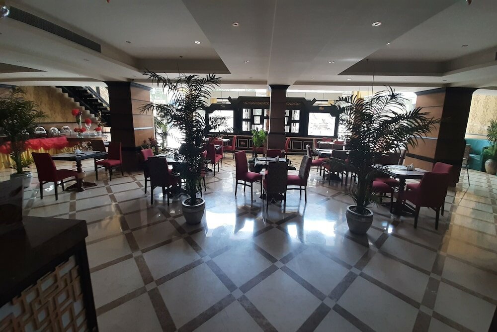 Фото The Blue Rose Hotel - الورده الزرقاء للوحدات السكنيه