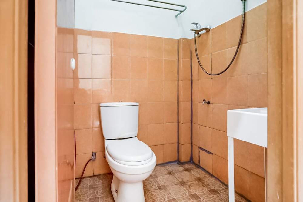 Фото Oyo 91160 Wisma Srijaya Syariah