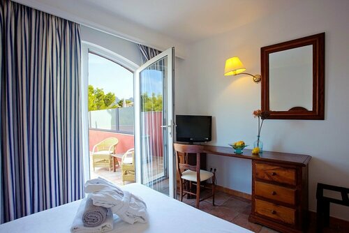 Внешний вид отеля Hotel Cala Sant Vicenç - Adults Only + 16 в Пойенсе, фото 3