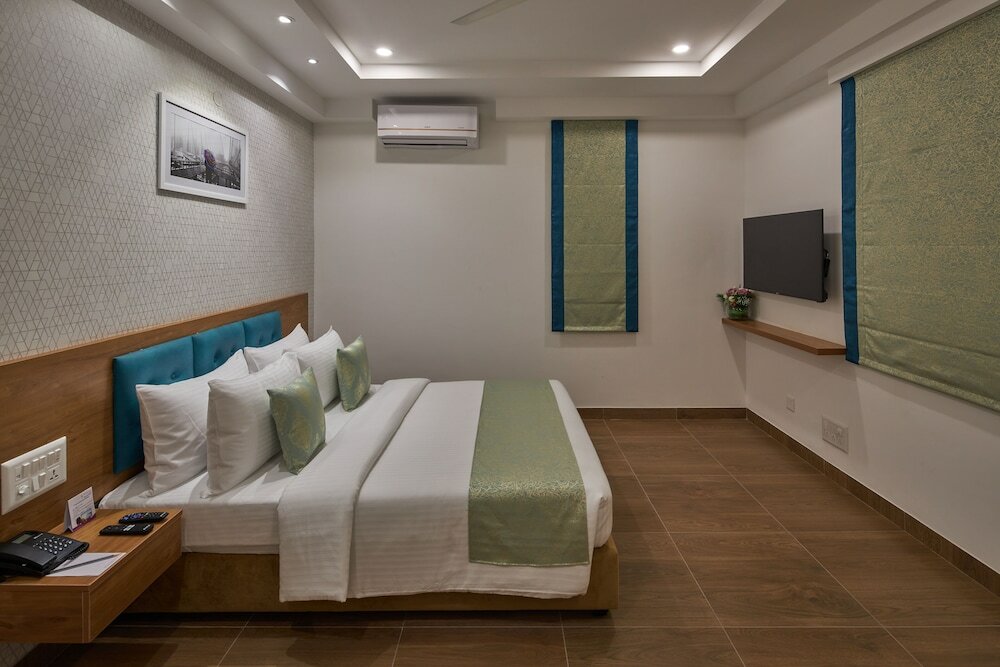 Фото Regenta Inn 4th Block Koramangala