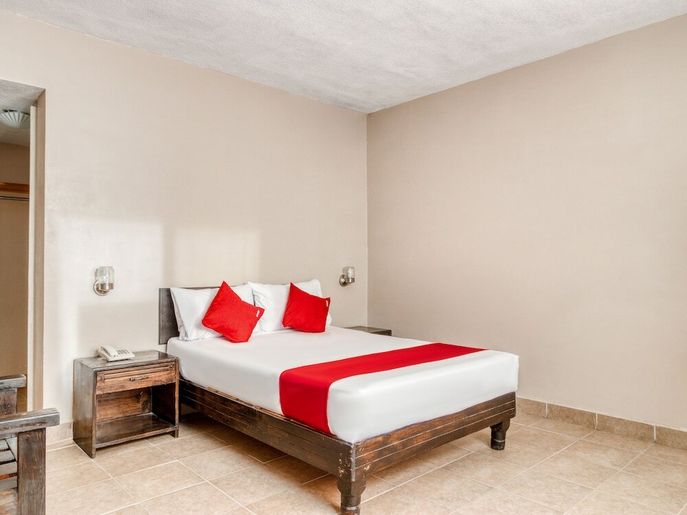 Фото Capital O Hotel La Siesta, Gómez Palacio