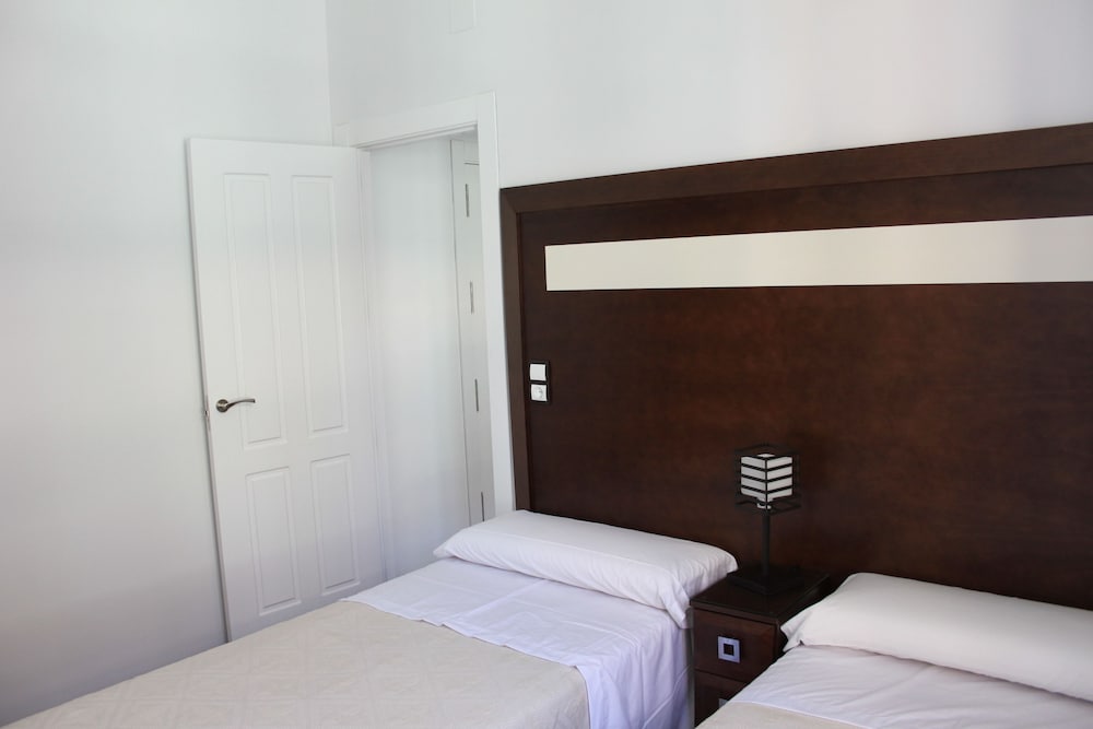 Фото Apartamentos Casa de la Lonja