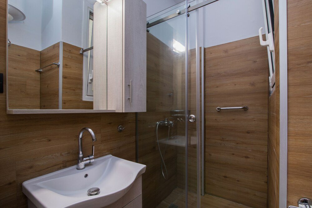 Фото Down Town Apartment by Corfuescapes