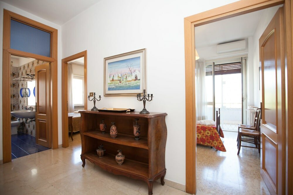 Фото Rental In Rome Devoti Apartment