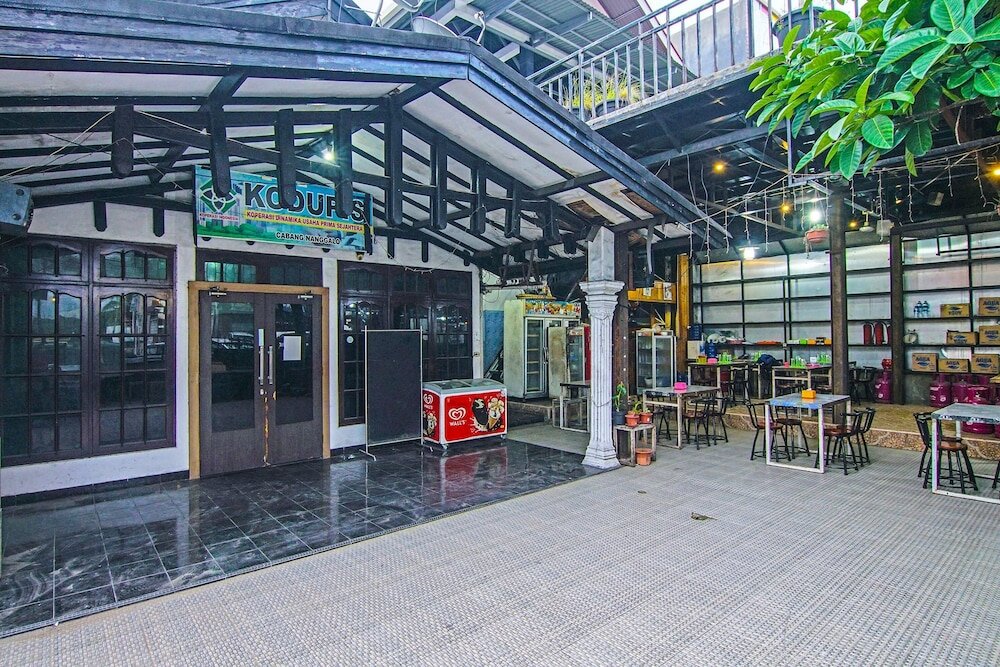 Фото Oyo 91730 De' Mande Homestay Syariah