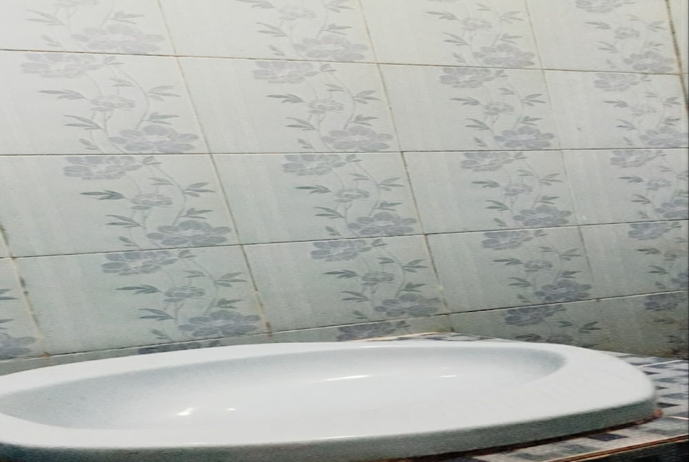 Фото Oyo 90706 Kost Alam Jaya Syariah