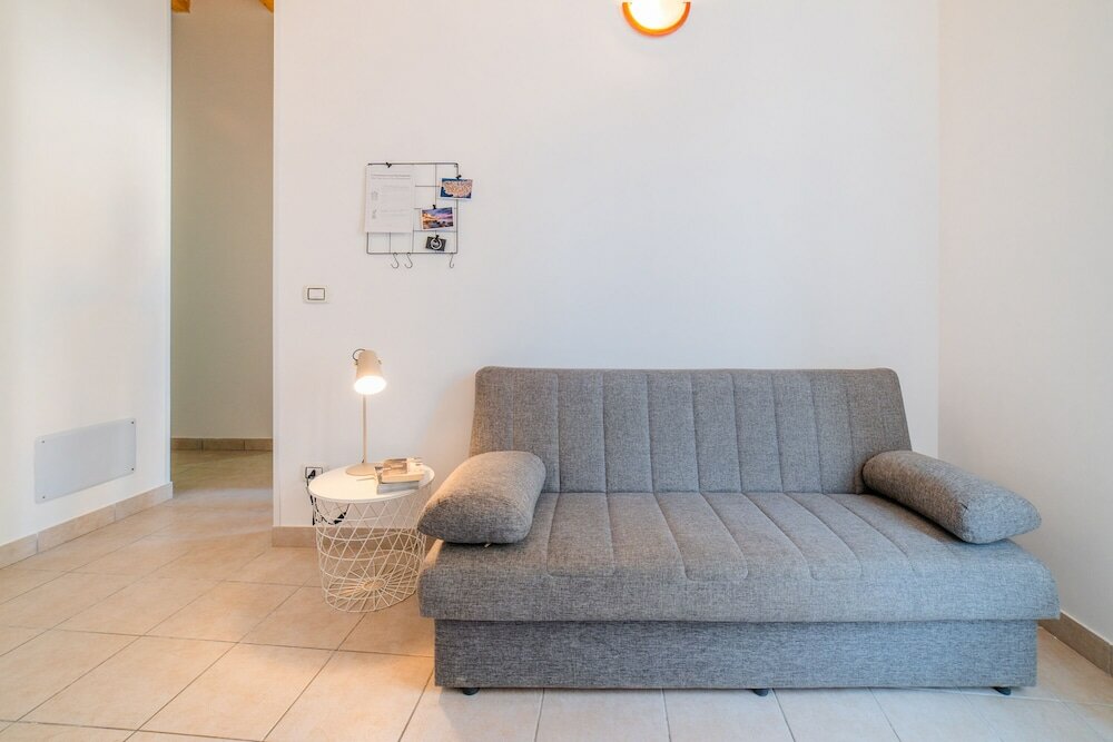 Фото Charm Of Ortigia Central Flat