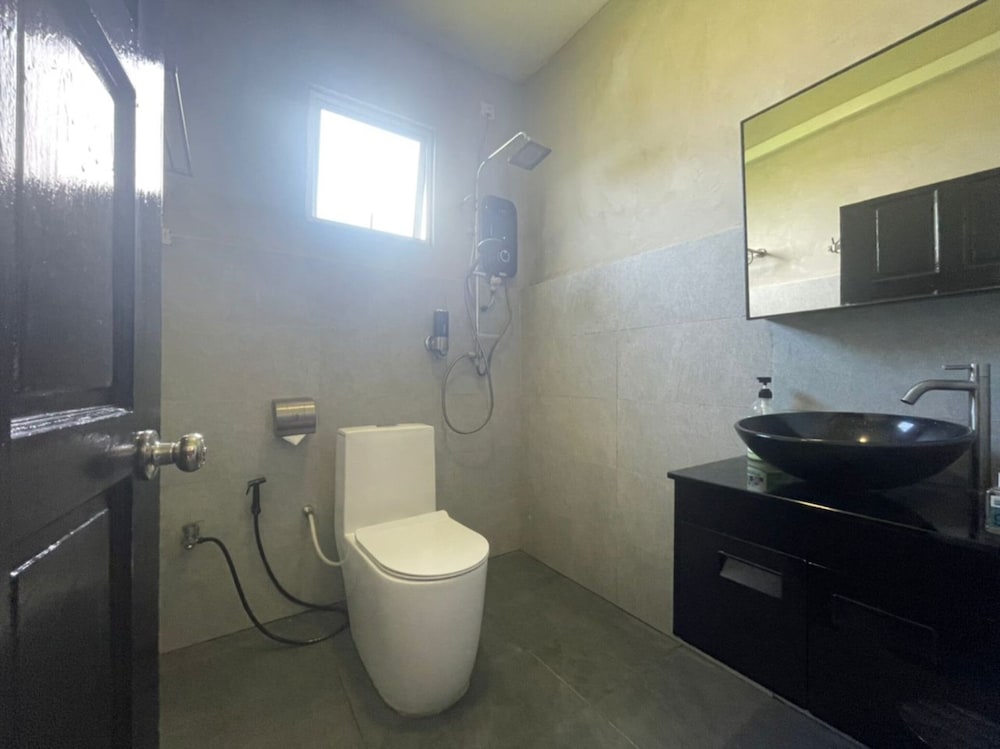 Фото Oyo Home 90370 D'tampi Homestay