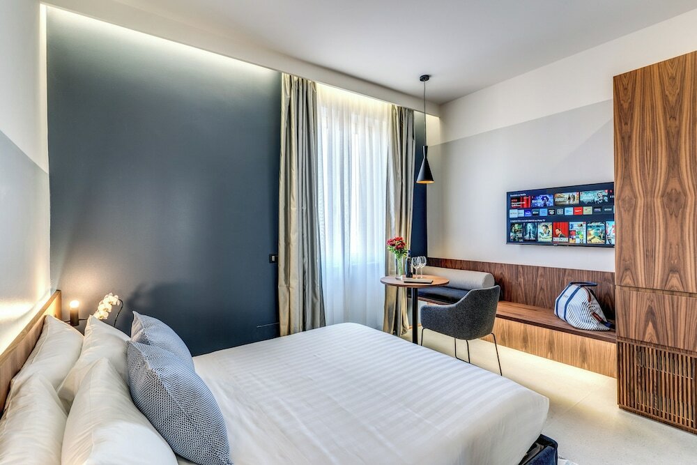 Фото Sospeso Boutique Hotel