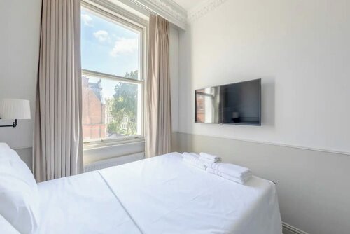 Гостиница Luxurious & Stylish 2bd Flat - South Kensington в Лондоне