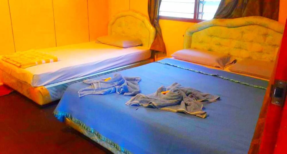 Фото Sukau Backpackers B&b