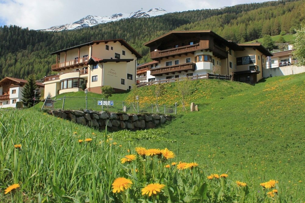 Фото A Casa Juwel - Ski in & Out Appartements