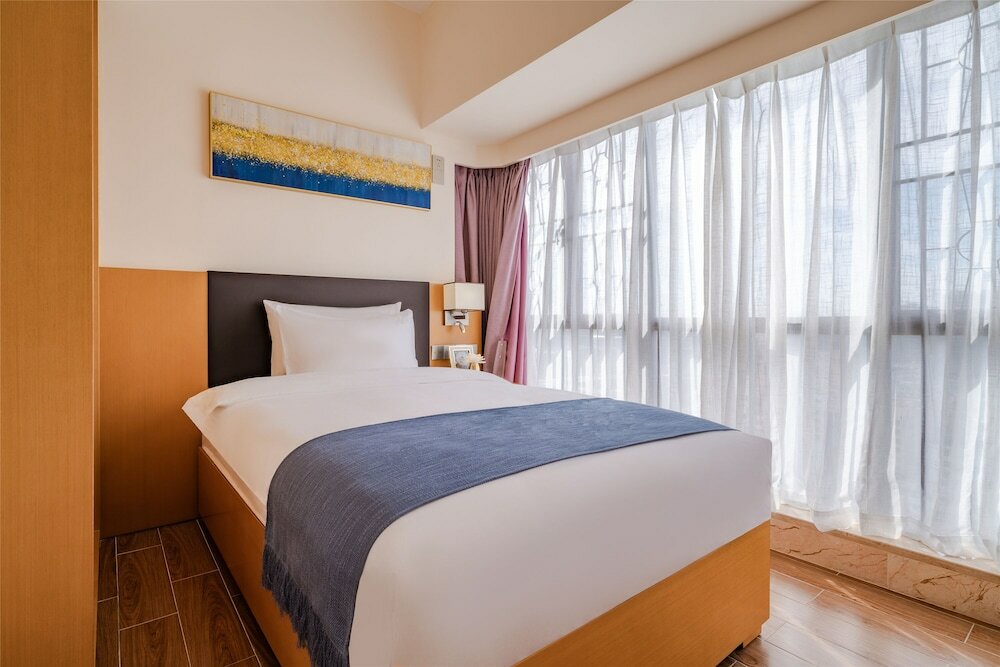 Фото Ding Shang Service Apartment Hotel