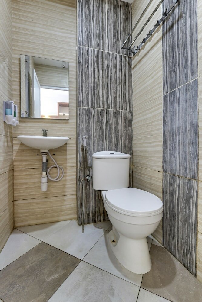 Фото Oyo Flagship 90973 Hotel Karunia Pkpri