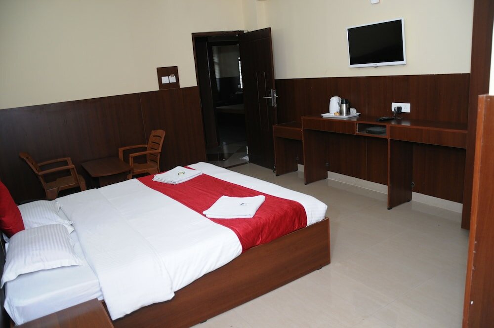 Фото Mysore Mayflower Hotel