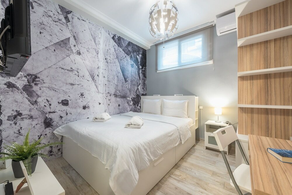 Фото Welcoming Koukaki Home by Cloudkeys