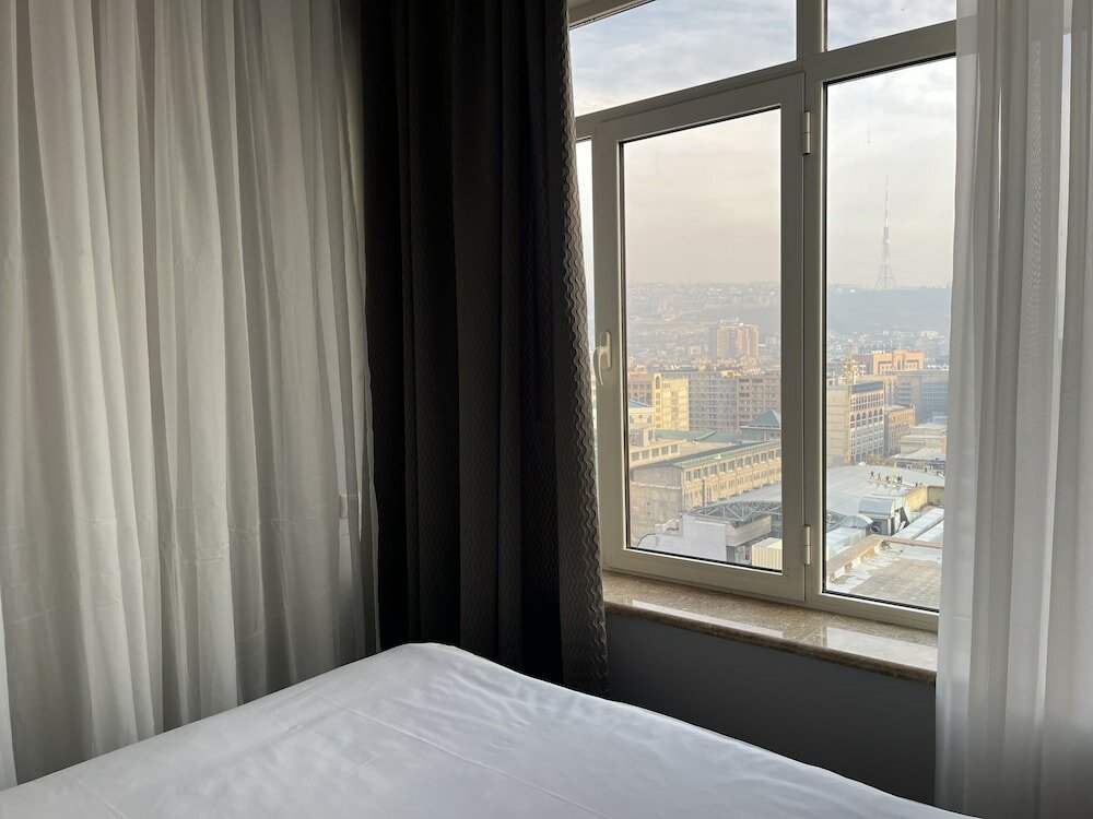 Фото Rooftop City View apartments