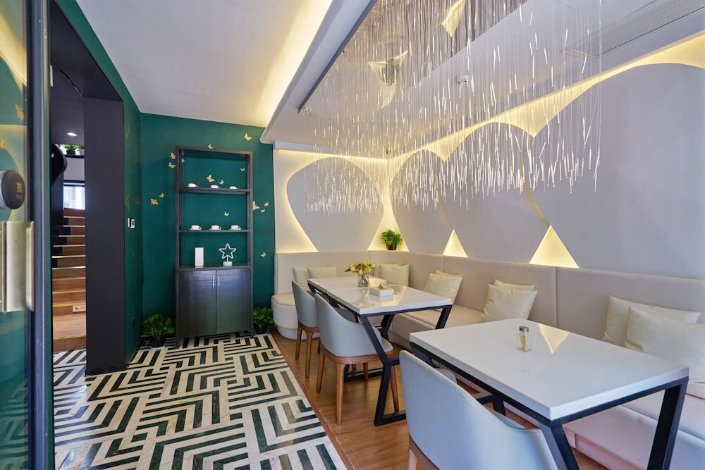 Фото Wuhua Xingxiang Shanfang Hotel