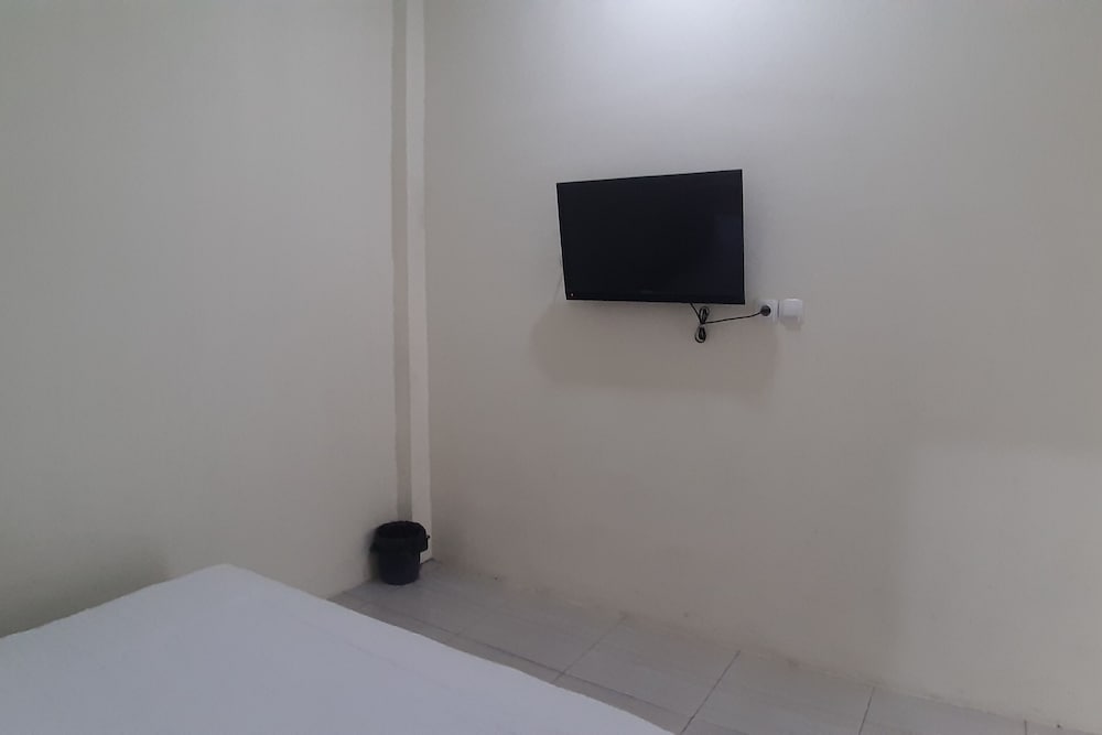 Фото Oyo 90299 Corner Guest House