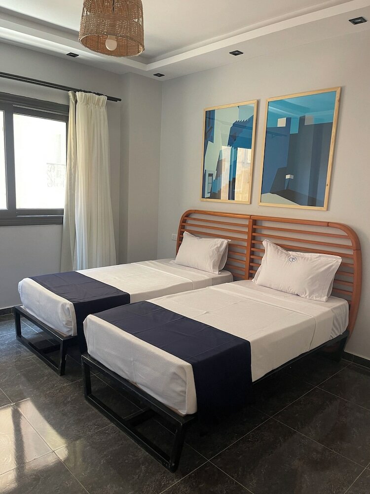 Фото Travelholic Auc Residence