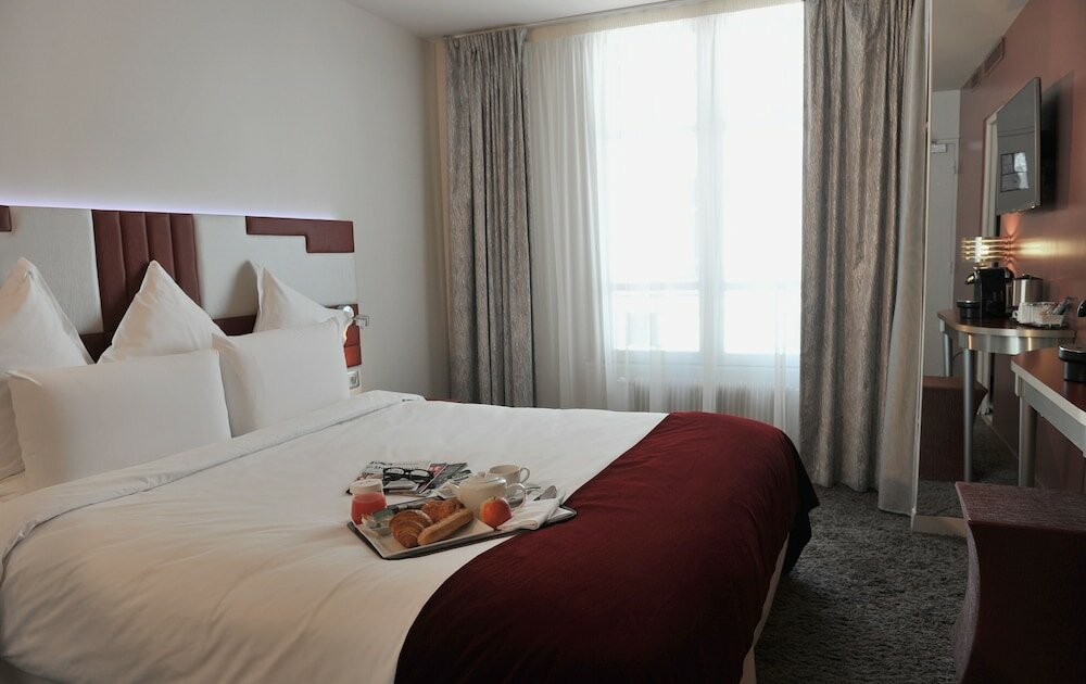 Фото Mercure Paris Opéra Faubourg Montmartre