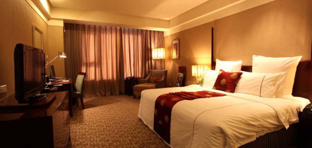 Фото Grand New Century Hotel Binhai Tianjin