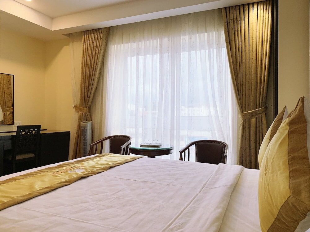 Фото Hoang Minh Chau Ba Trieu Hotel