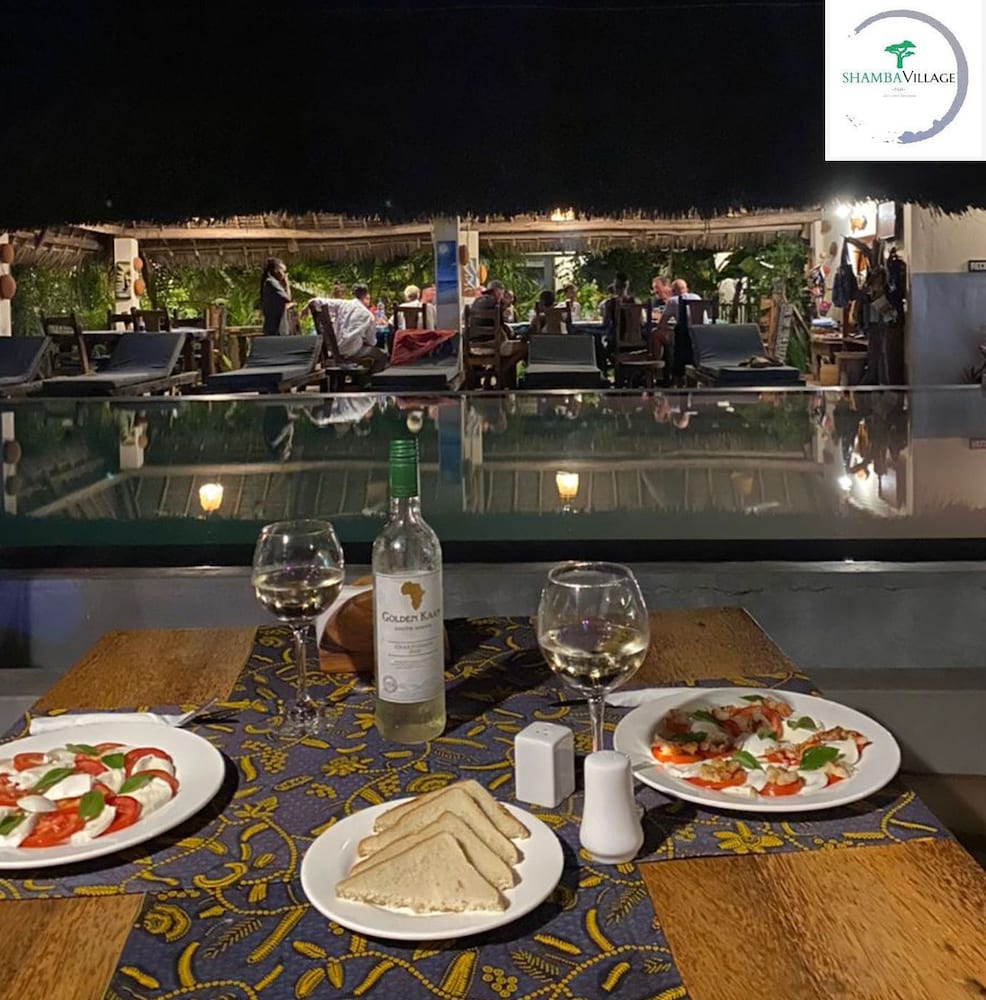 Фото Shamba Village Hotel