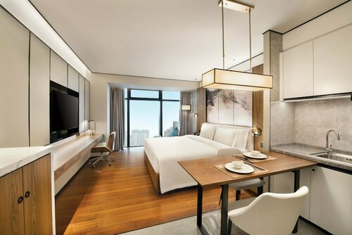 Гостиница Howard Johnson by Wyndham Optics Valley Residence Wuhan в Ухане