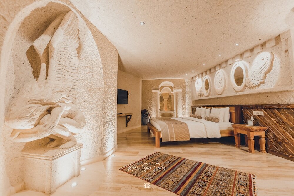 Фото Nino Cave Suites