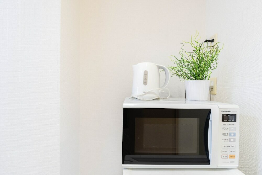 Фото Shinsaibash East Nana Apartment · Junan