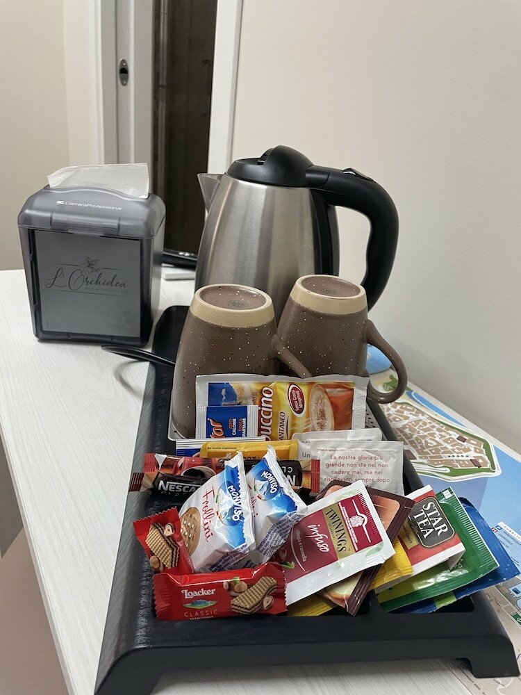 Фото B&b L'Orchidea