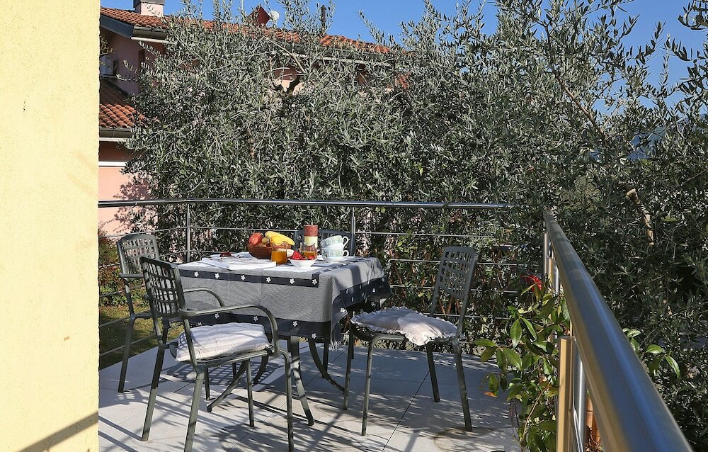 Фото Casa per Ferie Garda Il Melograno